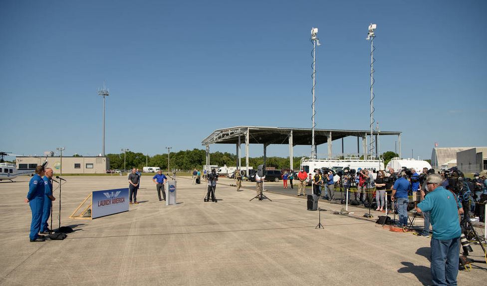 NASA astronauts Robert Behnken, left, and Douglas Hurley speak to members of the media after arriving at the Launch and Landing Facility at NASA’s Kennedy Space Center ahead of SpaceX’s Demo-2 mission, Wednesday, May 20, 2020, in Florida.
Credits: NASA